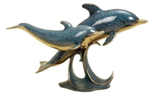 dolphin in the shape of an amulet of love